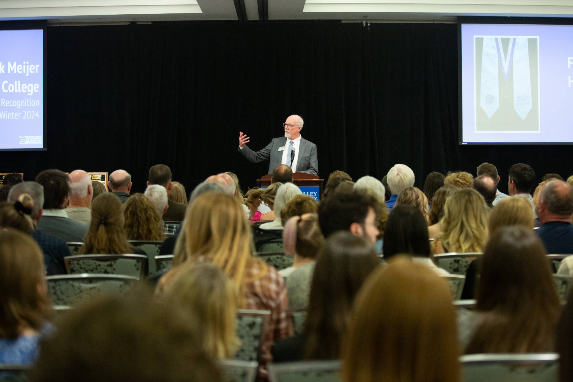 Dr. Roger Gilles speaking to the audience.